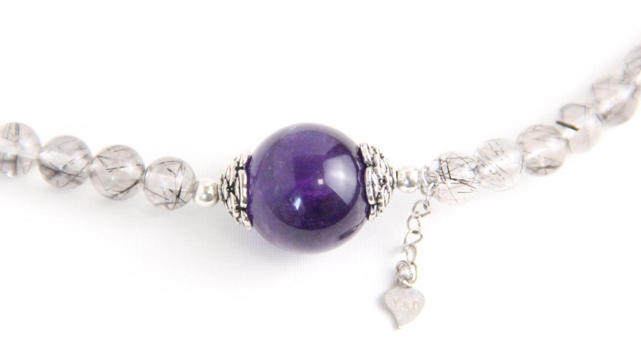 YAN Amethyst gemstone blog picture of silver rutilated quartz with amethyst bead necklace